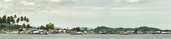 stock image Village of fishermen on tropical coast.Panorama.