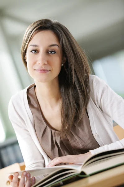Young woman with book Stock Image