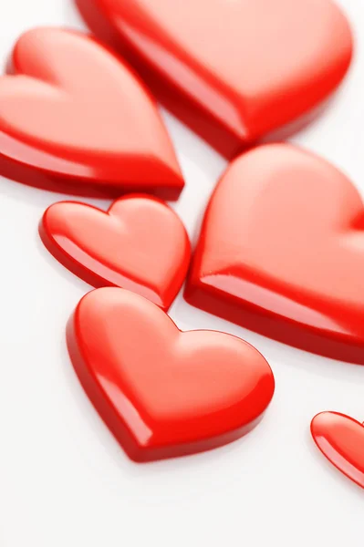 Red hearts on white background Royalty Free Stock Photos