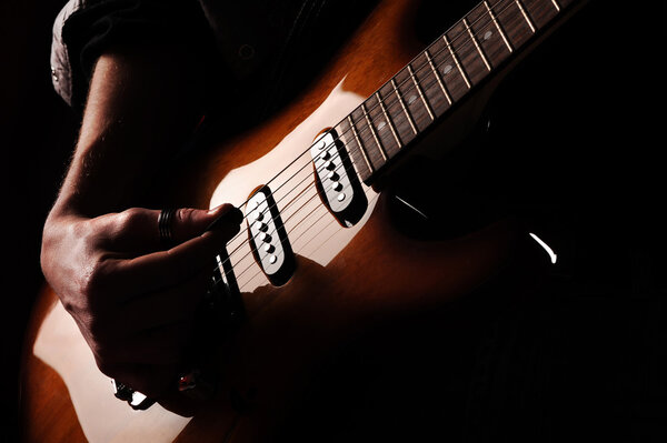 Close up of hands guitarist