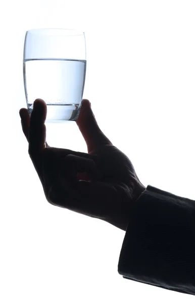 Homme avec un verre d'eau, seule main — Photo