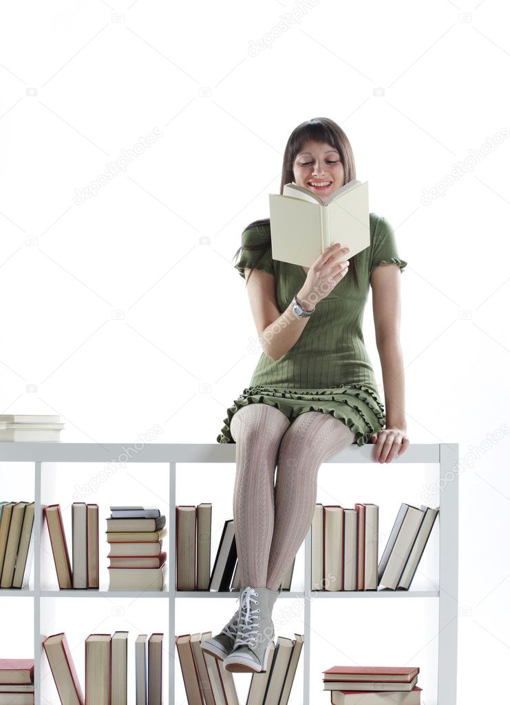 Young Woman holding an open book . cover is blank