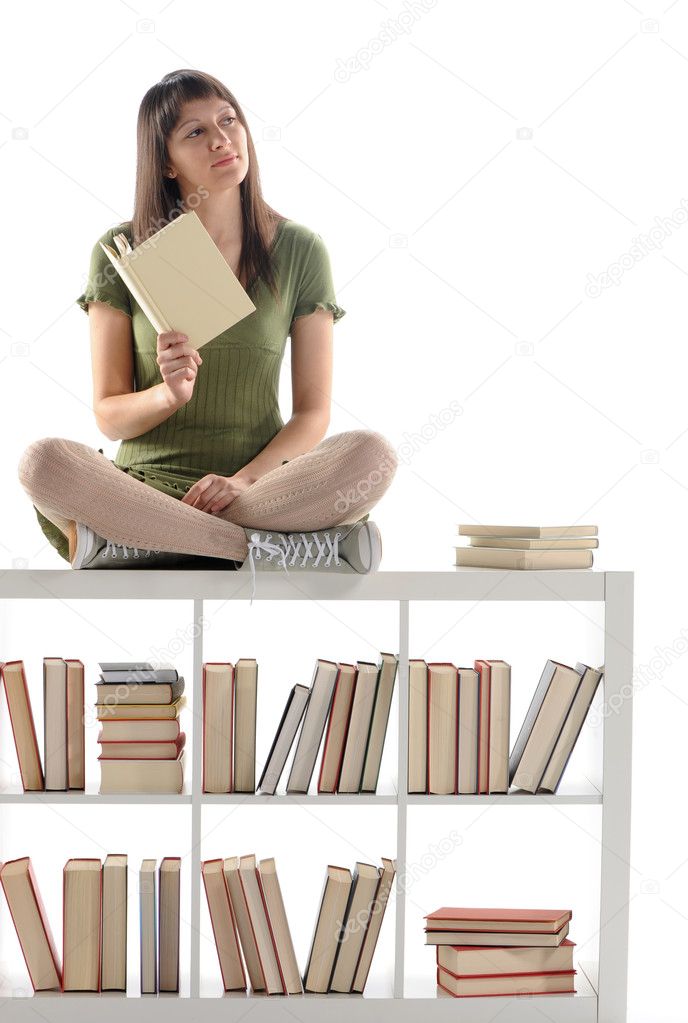 Thinking woman holding a book, cover is blank
