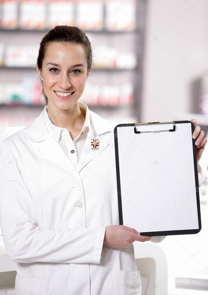 At pharmacy. Photo of an attractive young woman pharmacist with