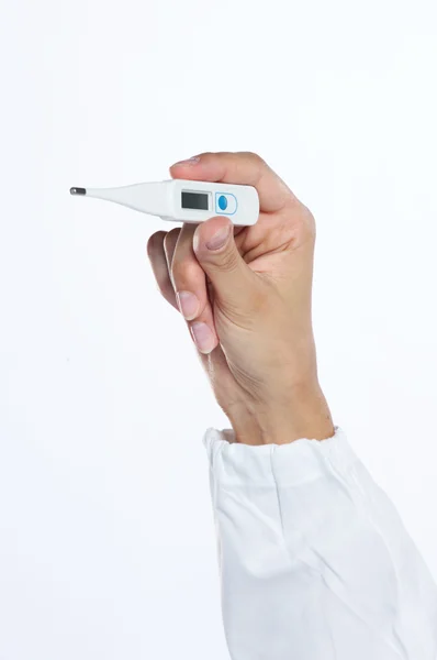 Checking Temperature, hand close up on white background — Stock Photo, Image