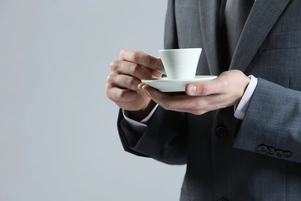 Close up business man with coffee cup — Stock Photo, Image
