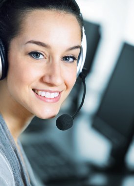 Cute business customer service woman smiling, computer on foregr clipart
