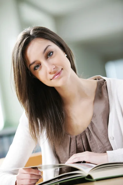 Young woman with book Stock Image