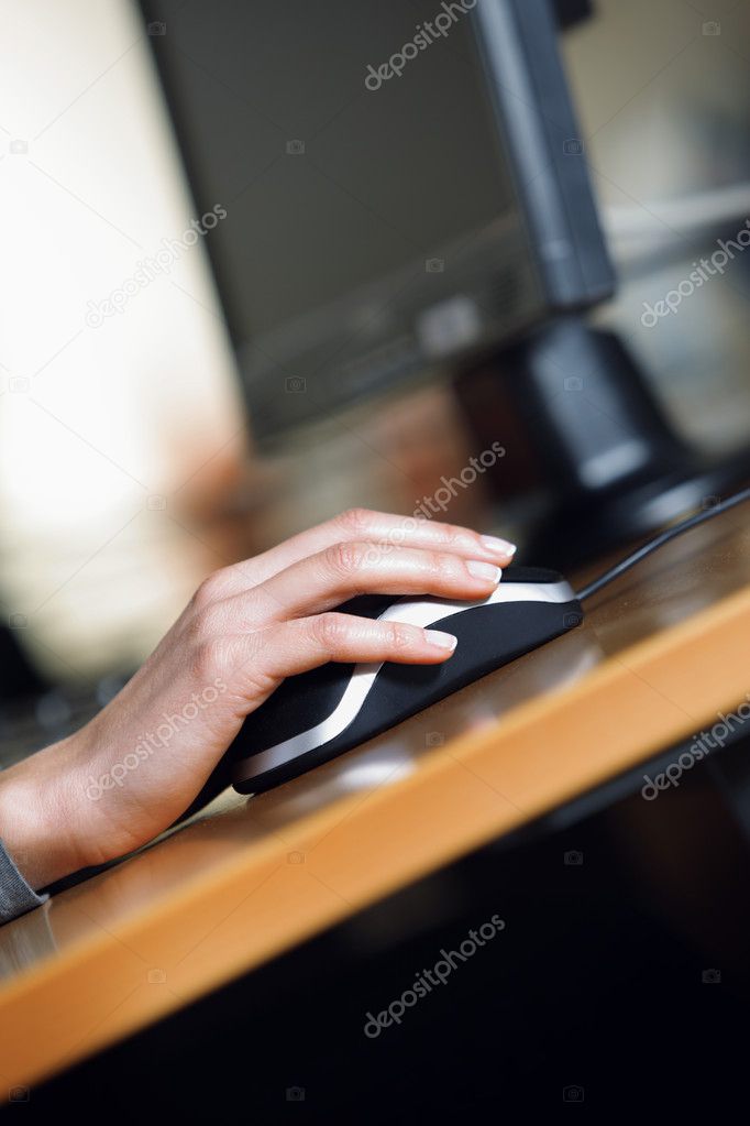 Close up, female hand using laptop