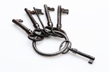 Old keys on white background, close-up clipart