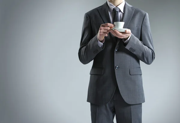 Geschäftsmann aus nächster Nähe mit Kaffeetasse — Stockfoto