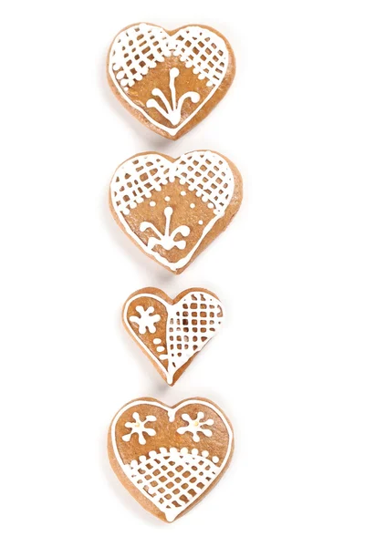 stock image Gingerbread hearts on white