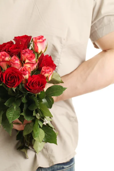 Homem segurando rosas — Fotografia de Stock