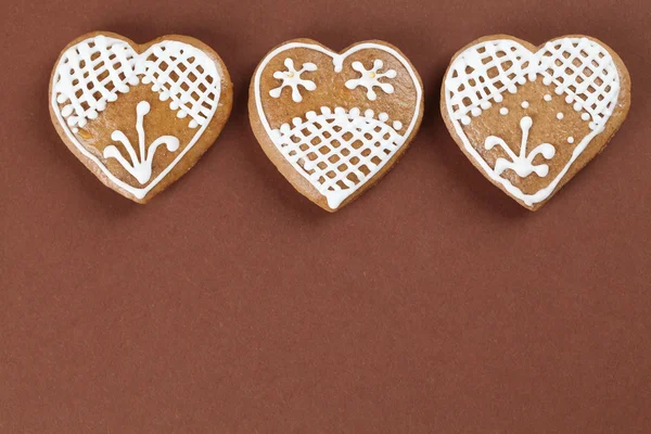 stock image Gingerbread hearts on brown