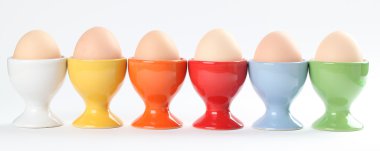 Eggcups with eggs clipart