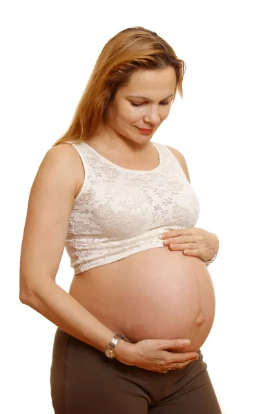 stock image Pregnant woman. Isolated on white.