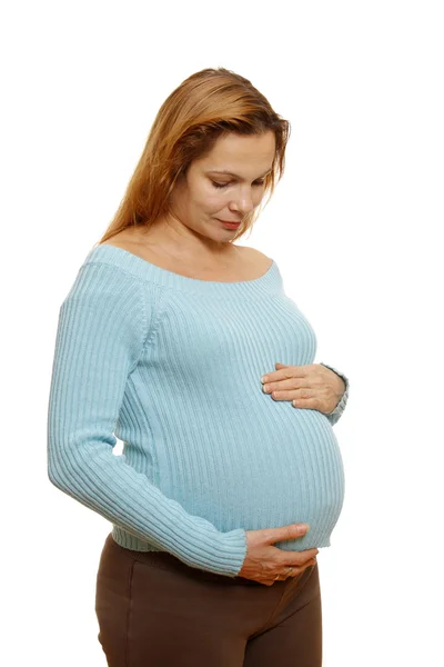Una mujer embarazada. Aislado sobre blanco . — Foto de Stock