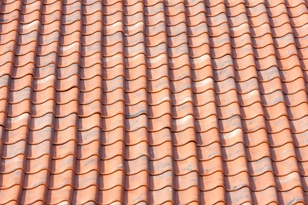 Azulejos de techo naranja fondo — Foto de Stock