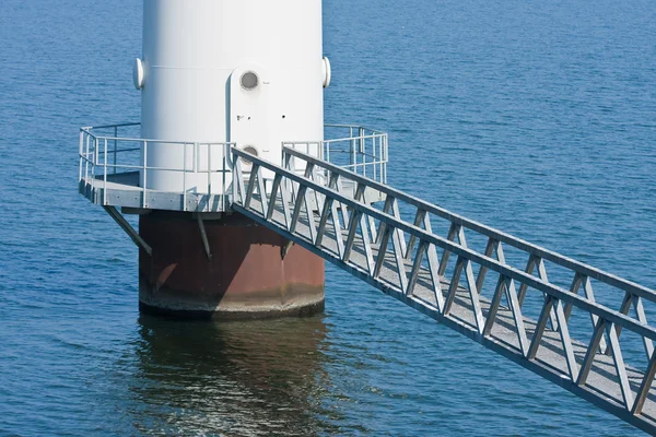 Footbridge for maintenance of a windmill standing in the sea; th — Stock Photo, Image