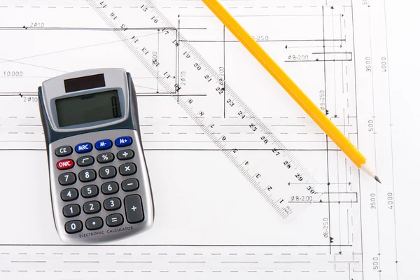 Building plan with calculator, ruler and pencil — Stock Photo, Image