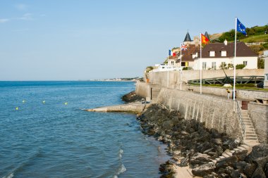 Seafront of Arromanches-les-Bains on the English Channel clipart