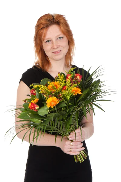 Young attractive woman with a bouquet of flowers - isolated on w — Stock Photo, Image