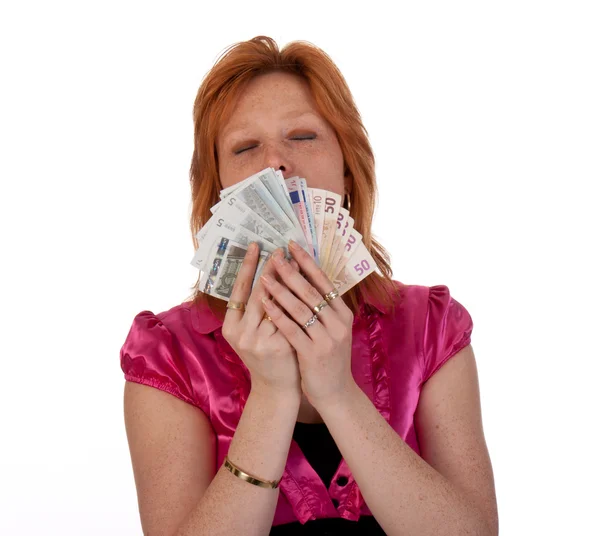 Portret van vrij jonge vrouw met geld, geïsoleerd op witte bac — Stockfoto