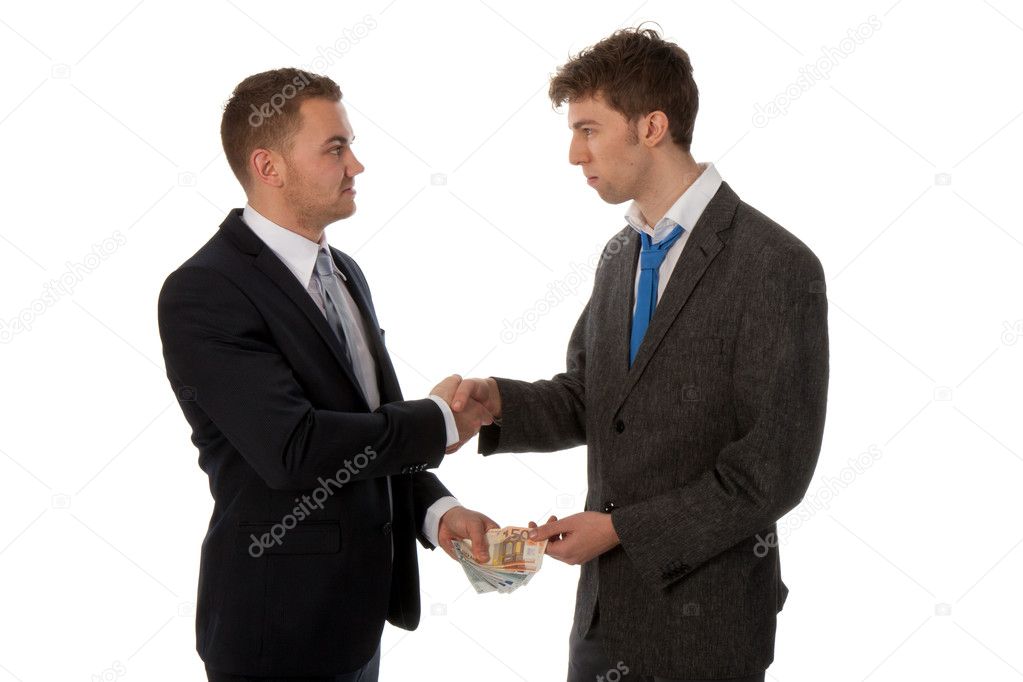 Businessman shaking hands. The deal is made and one businessman