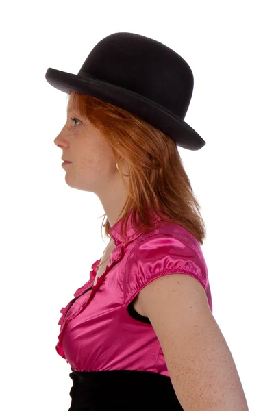 Pretty redhear girl in a pink blouse with a bowler — Stock Photo, Image