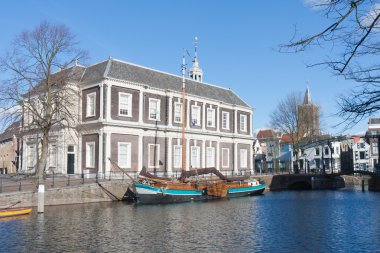 Traditional wooden barge in old historic harbor of Schiedam, The clipart