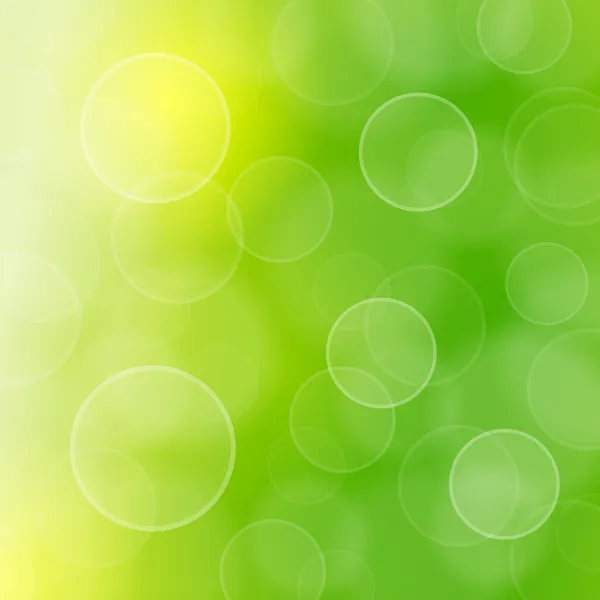 Wazig groene cirkels en bokeh — Stockvector