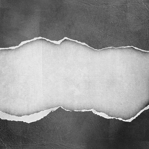 Рваная винтажная бумага на фоне гранжа — стоковое фото