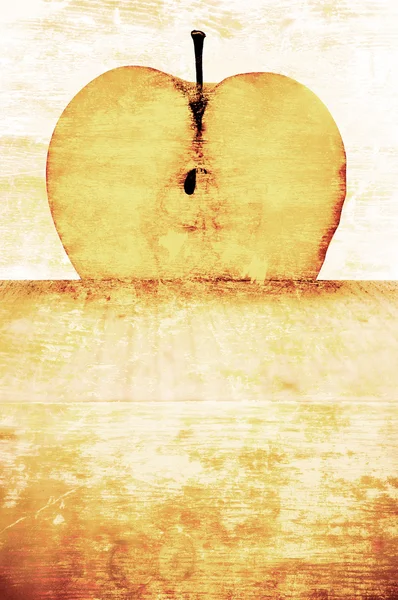 Apple aan boord van grunge achtergrond — Stockfoto
