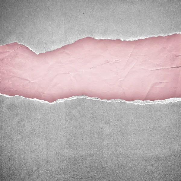 灰色の終わり光のピンクの紙の背景をリッピングします。 — ストック写真