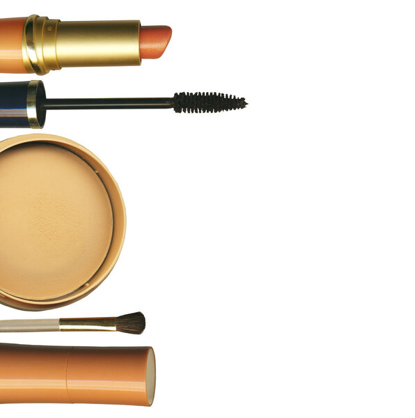 Make-up : liptick, face powder and mascara isolated on white