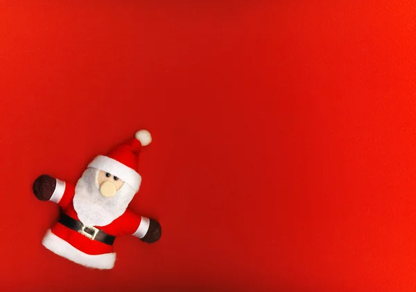 Санта-Клаус на красном фоне — стоковое фото