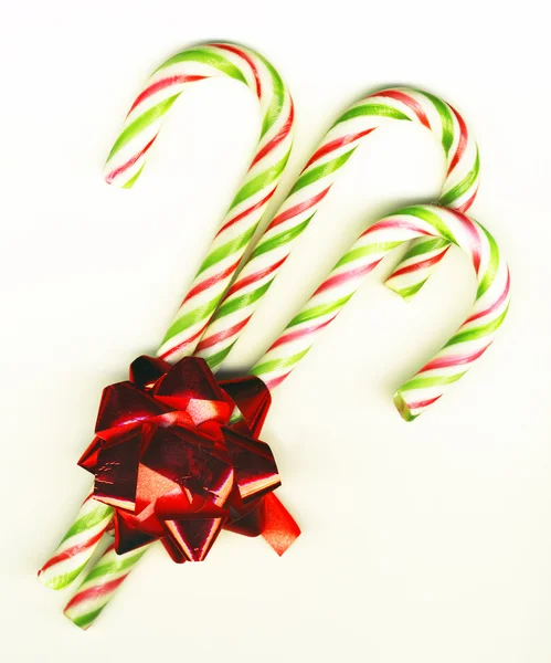 Candy canes with a bow — Stock Photo, Image