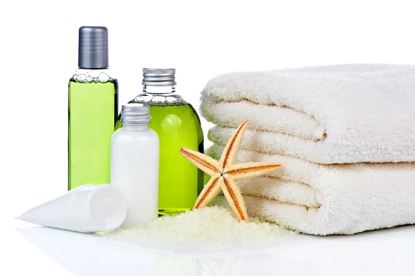 Kosmetyki do pielęgnacji skóry i ręcznik — Zdjęcie stockowe