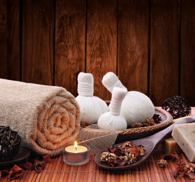 Spa massage setting with candlelight clipart