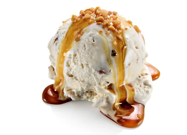 Dondurma kaşık ile karamel tepesi — Stok fotoğraf