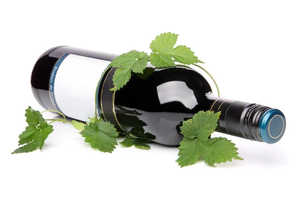 Fles rode wijn, opleggen van zijn kant — Stockfoto