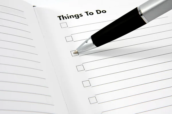 Things to do list with pen — Stock Photo, Image