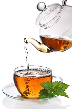 Tea poured into cup clipart