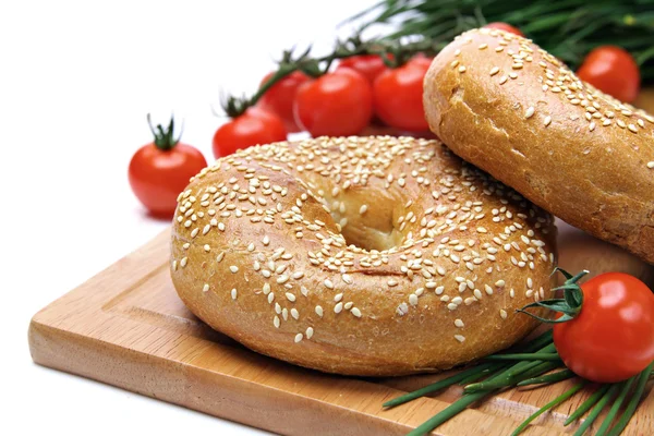stock image Fresh bagels, tomatoes and chives