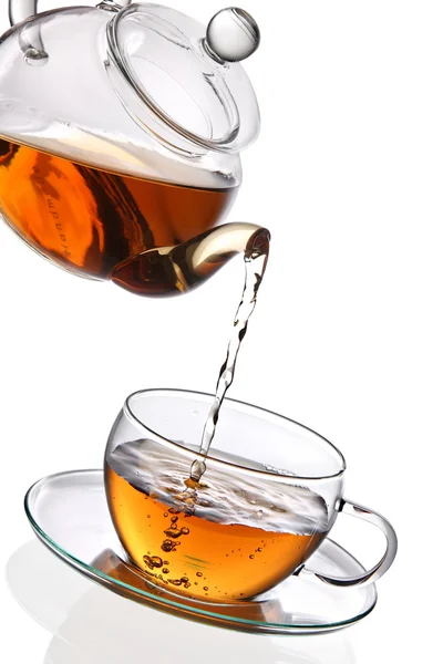 Tea poured into glass cup — Stock Photo, Image