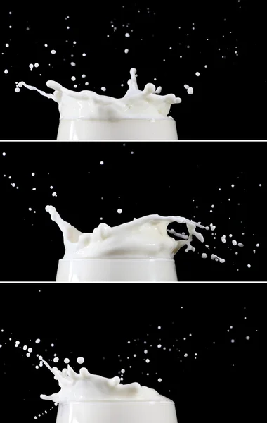 Milk splashing into glass — Stock Photo, Image