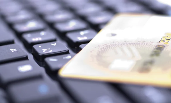 Stock image Credit card on keyboard