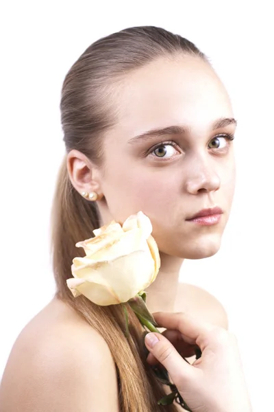 Mooi meisje met een bloem geïsoleerd — Stockfoto
