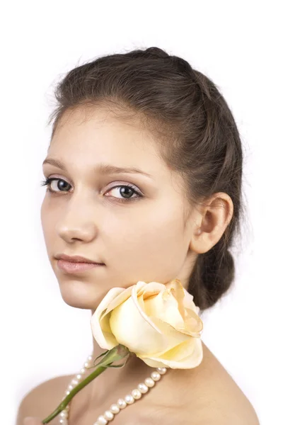 Portrait of young pretty woman with rose — Stock Photo, Image