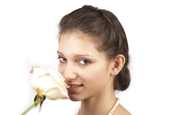 Young beautiful girl with rose — Stock Photo, Image